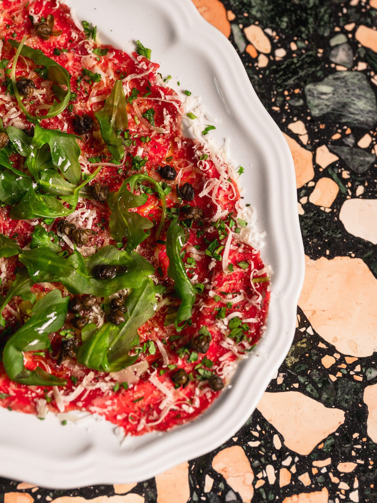 Wagyu beef carpaccio with arugula and parmigiano